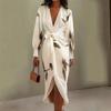 Printed dress women's spring and summer long-sleeved dress new fashion lace-up deep v-neck medium and long dress