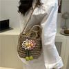 New beautiful hollow straw weaving high-end temperament casual portable shoulder messenger bag bucket bag woman