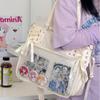 Sac bandoulière style collège avec ruban Grande capacité pour livres de cours Sac de facteur Filles Nœud JK Sac à bandoulière Sac à main