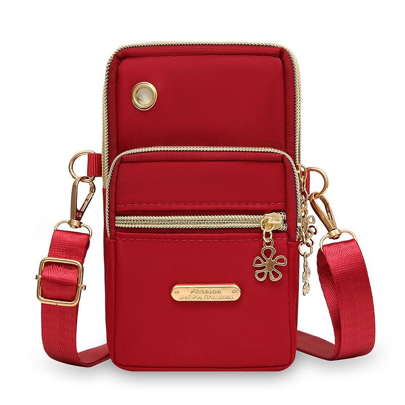 

New mobile phone bag female messenger bag neck wrist change bag mobile phone bag mini small bag червоний
