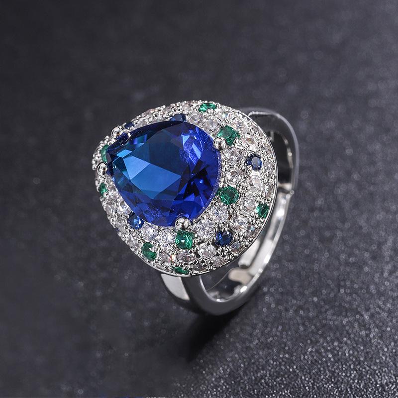 

Ювелирный набор: кольцо, серьги-пусеты, подвеска, имитация синего стекла, форма капли воды, сочетание цветов, 10 * 12