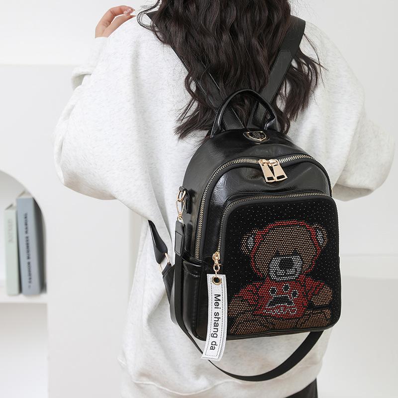 Schoolbag1011 new cartoon bear backpack female Korean version cute hot diamond large capacity backpack soft leather casual travel bag