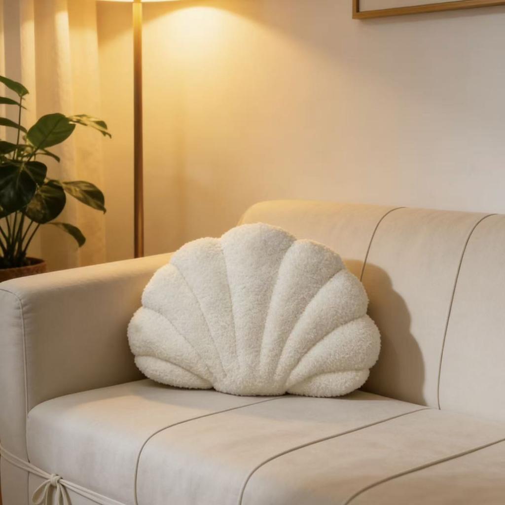 A seashell-shaped pillow, suitable for living room sofas, bedrooms, offices, and home decor.