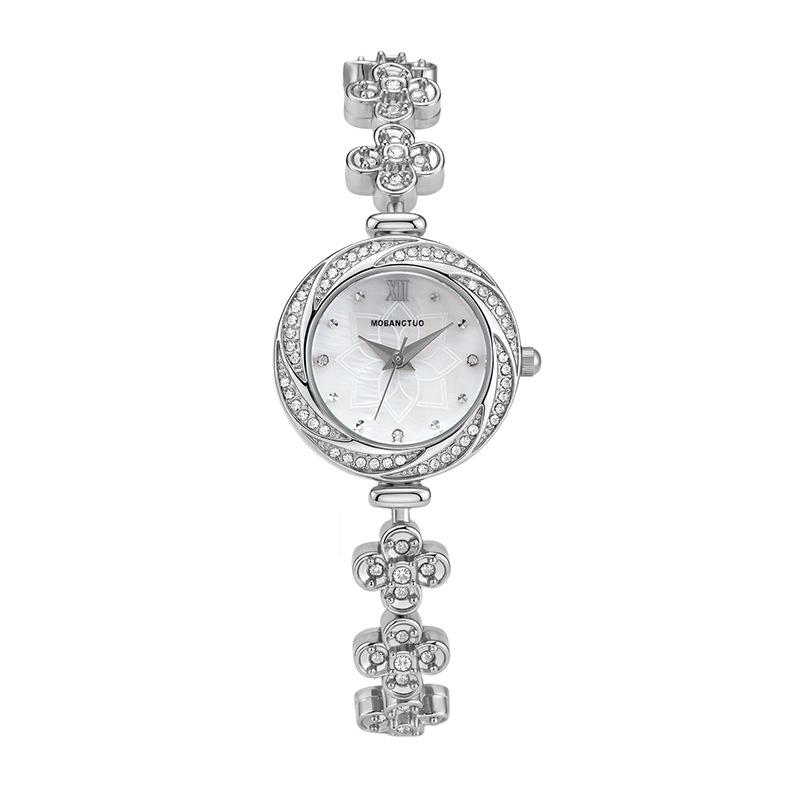 Light luxury diamond-encrusted women s watch niche design Fritillary four-leaf clover bracelet watch high-end fashion quartz watch