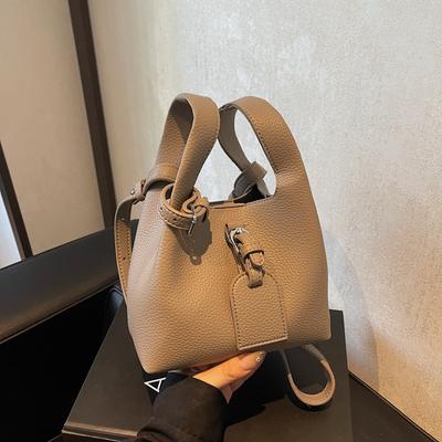 Niche retro handtas tas dames nieuwe eenvoudige schoudertas effen kleur crossbody emmer tas moeder en kind tas