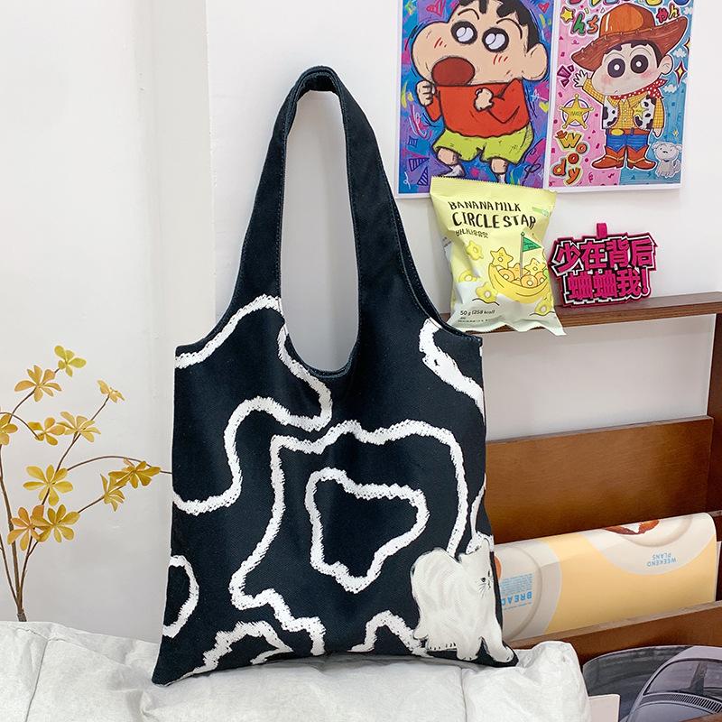 

Commuter large-capacity canvas bag women s 2025 new autumn and winter tide casual versatile shoulder bag college student tote bag