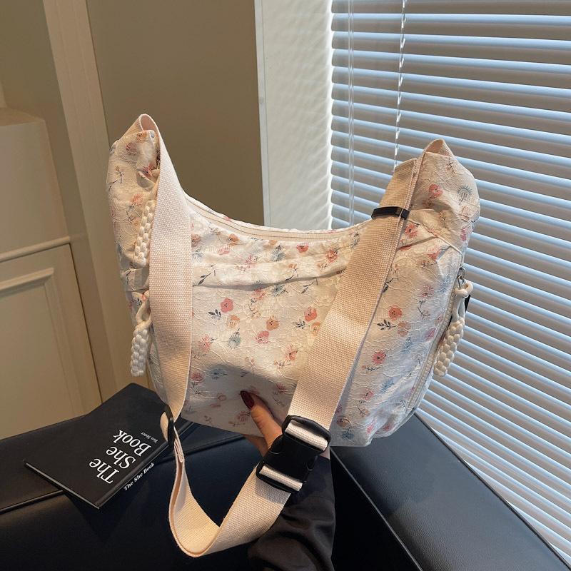Floral dumpling bag women's new commuter shoulder armpit bag versatile large-capacity messenger bag