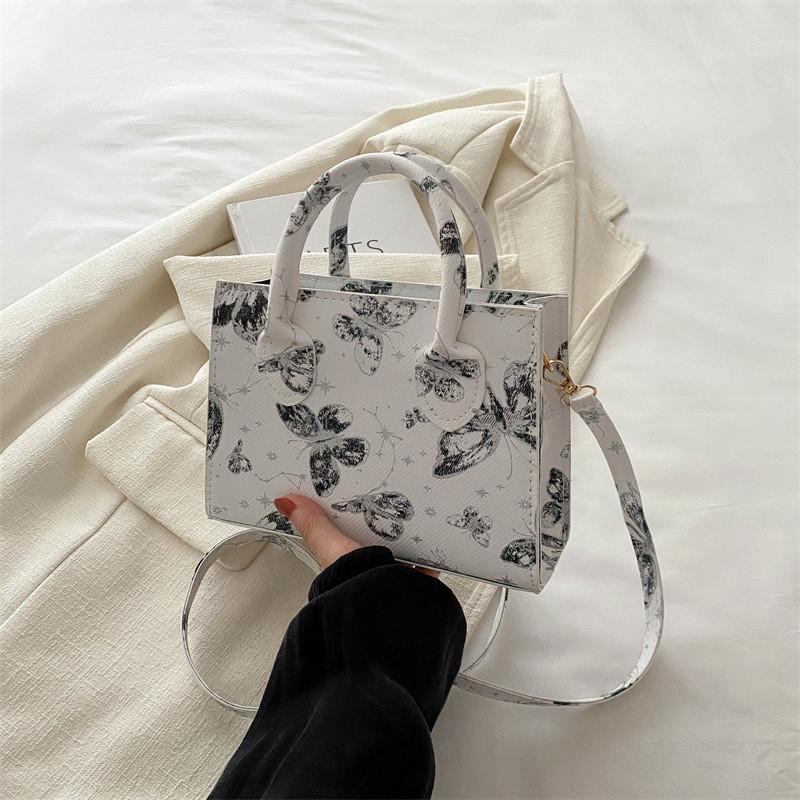 

Stylish Retro Shoulder Bag Featuring Fresh Butterfly Pattern Ideal For Daily Use In Various Colors сірий колір