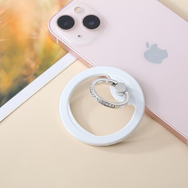 New mobile phone magnetic suction frame bracket Magnetic mobile phone ring charging universal metal diamond ring buckle desktop bracket белый