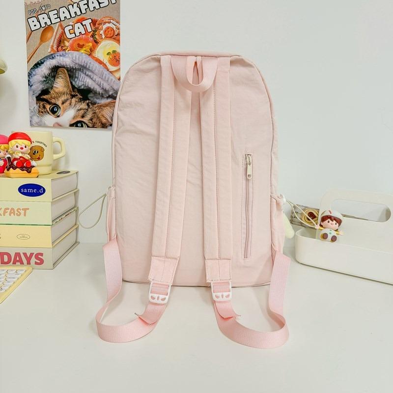 The new schoolbag is high-value, fresh and sweet, candy-colored backpack, lightweight and large-capacity backpack for junior high school students.