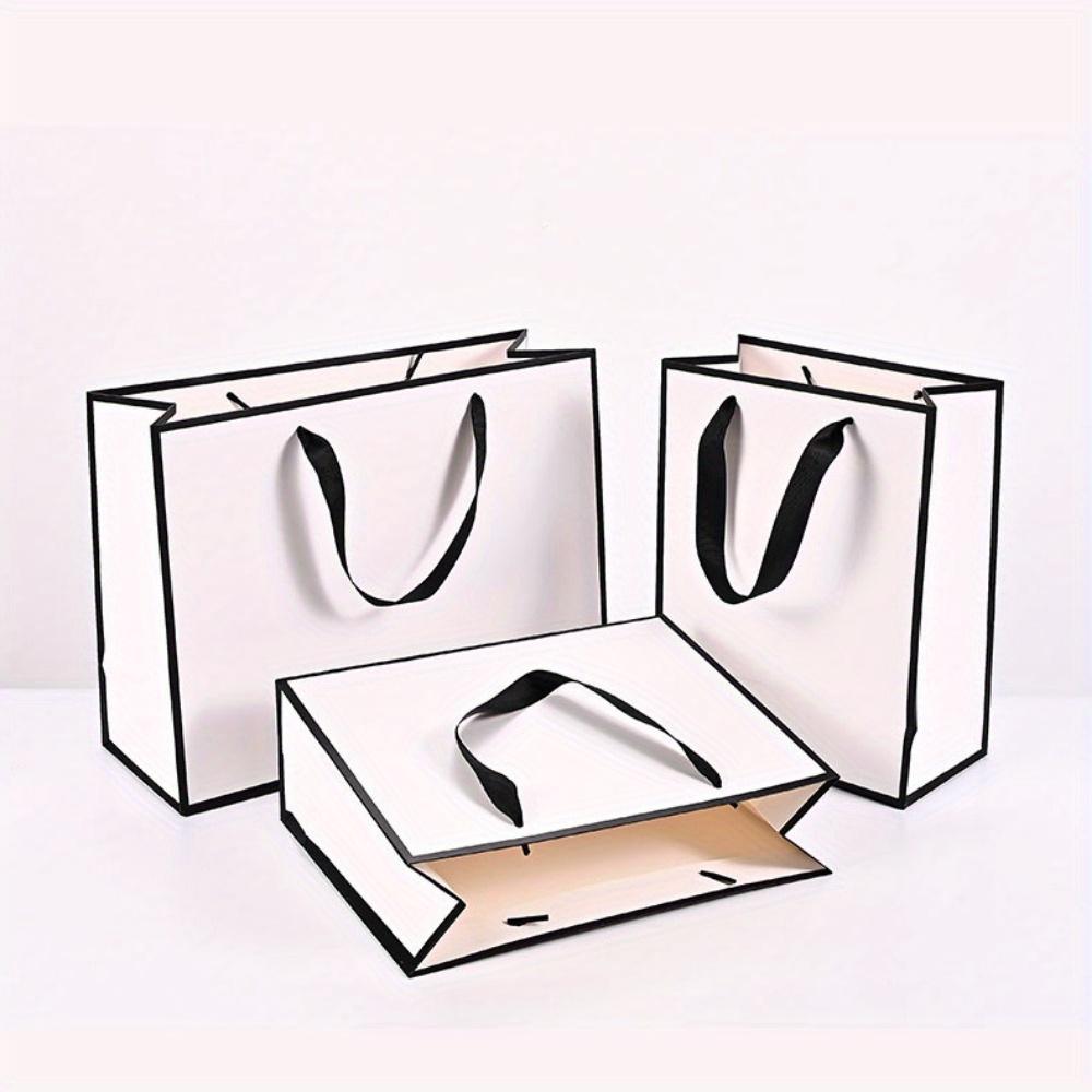 

10 шт. Пакеты для угощений с ручкой Белые подарочные пакеты Бумажная сумка-тоут Пакет для покупок Пакеты для подарочной упаковки для свадебных вечеринок Сумка-тоут Пакеты «Спасибо» Пакет для подарочной упаковки 10pcs 23*8*18cm белый