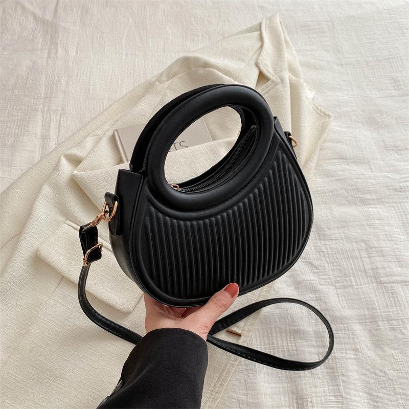 Solid color handbag women's 2025 early new fashion casual messenger bag portable small bag