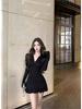 Elegant Deep V-Neck Long-Sleeve Top & High-Waisted Pleated Skort Set