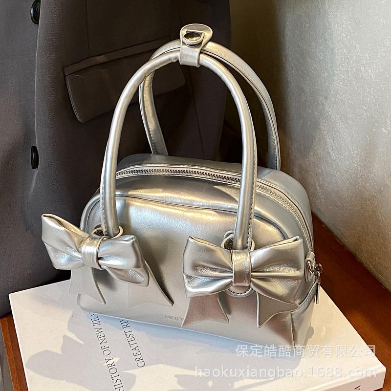 Niche simple bow handbag small bag women's texture pillow bag 2025 new fashion versatile messenger bag