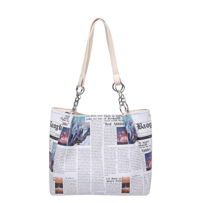 Internet celebrity newspaper shopping bag summer 2025 new Korean version fashion printing large capacity shoulder hand bucket bag woman