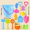 Children's beach and sandbox toy set, including a large round sandcastle bucket, sandcastle mold, and a large shovel. The colors