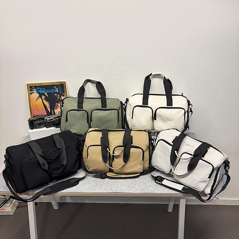 Portable independent bag, leisure travel bag, female messenger, large-capacity sports fitness bag, multi-pocket storage, luggage bag.