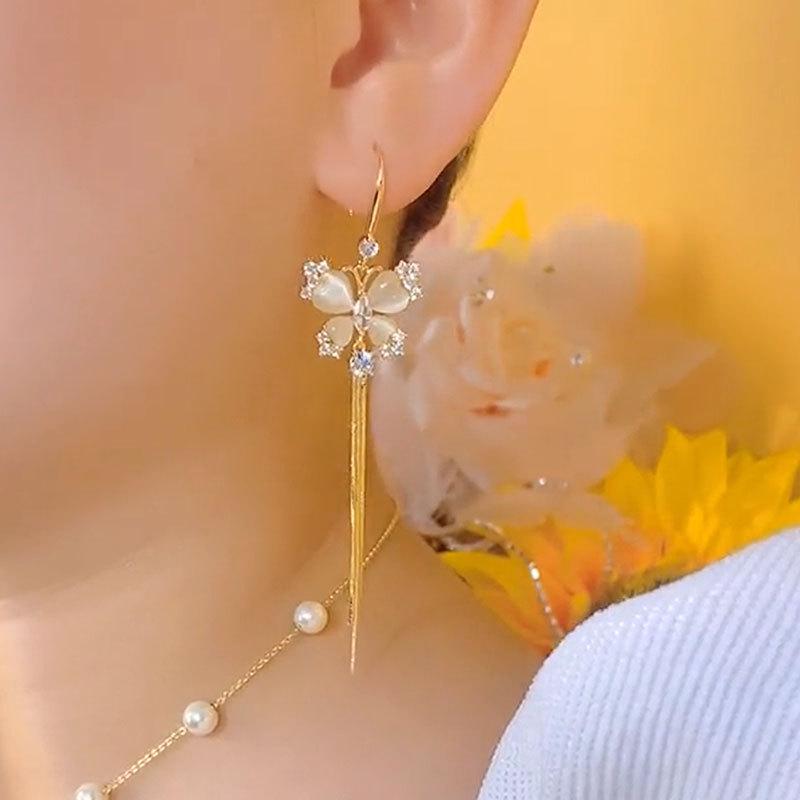 Elegant Butterfly Rhinestone Tassel Earrings - High-End, Trendy, and Flattering.