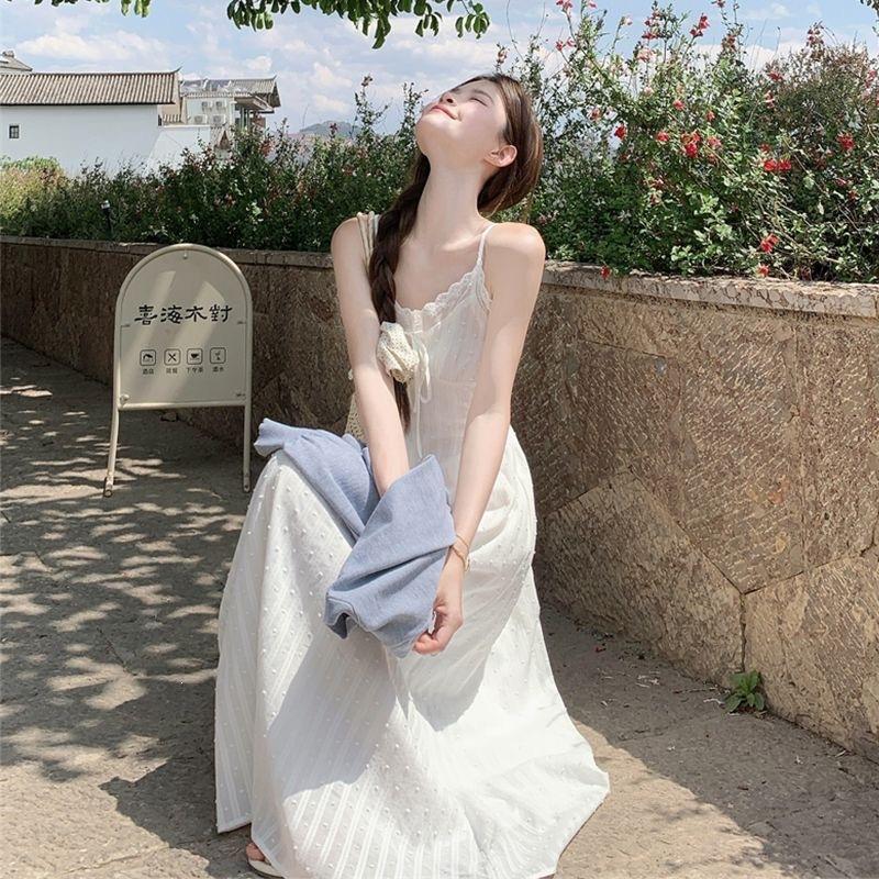 Pure desire wind lotus leaf edge sleeveless floral suspender dress women's summer new waist and thin temperament a word long dress