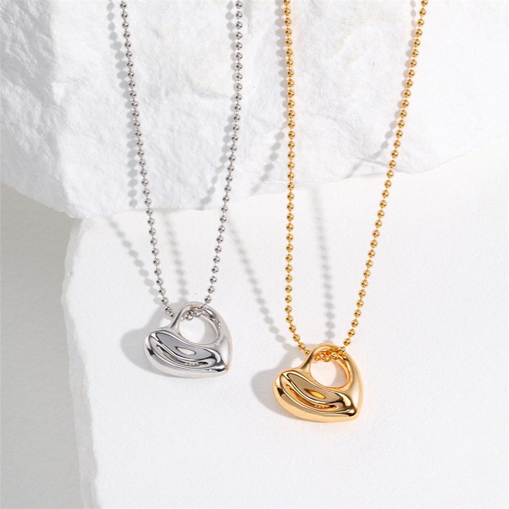Niche Titanium Steel Heart-Shaped Hollow Pendant Clavicle Necklace