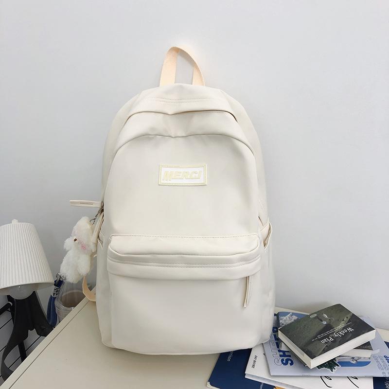 High-value schoolbag female Japanese ins large-capacity backpack solid color high school college student simple backpack