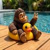 Miniature Sasquatch Figure And Duck Figurine, on Swimming Ring Statue, Playful Tabletop Accent Funny Animal Statue for Home Shelf Decor Creative