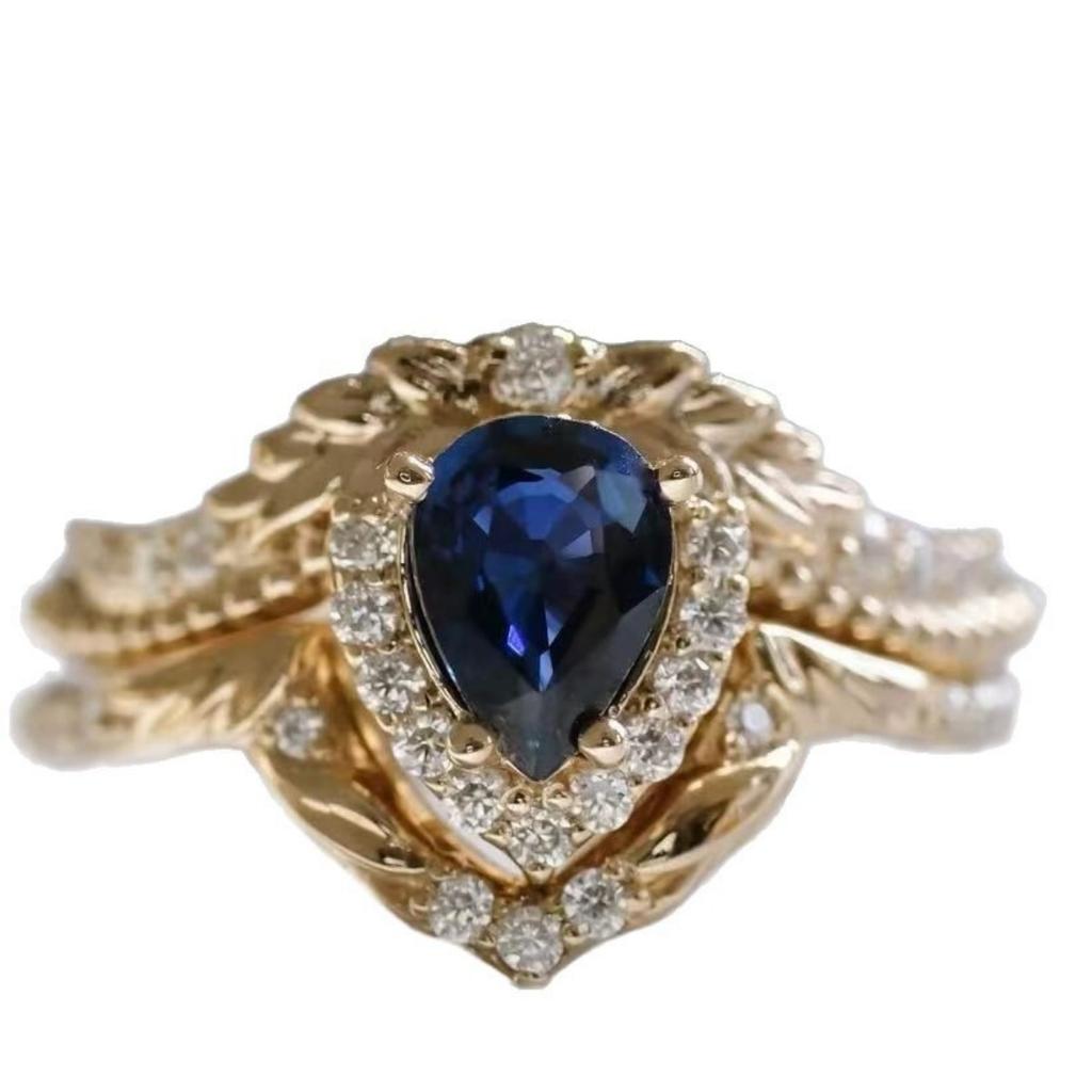 Luxury European and American Flower Wedding Ring Women's Fashion Crown Jewelry Inlaid with Blue Water Drop Zircon Set Ring