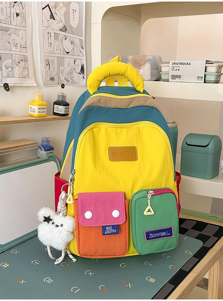 Schoolbag contrasting splicing Internet celebrity backpack female dopamine primary school bag Japanese large capacity burden reduction junior high