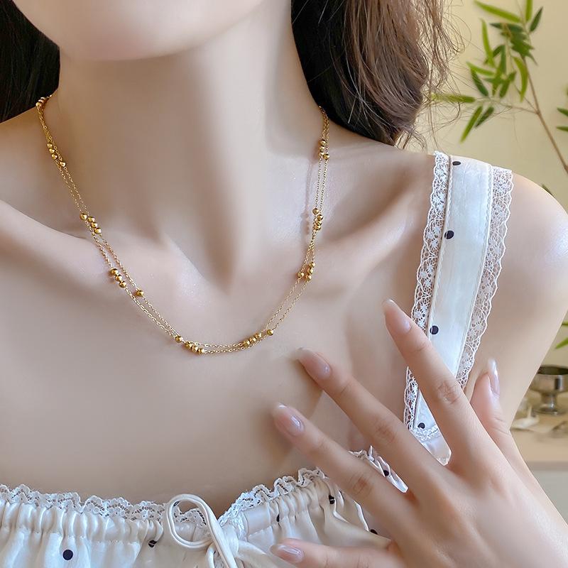 Chic Gold Double-Layer Round Bead Necklace: French Style, High-End Luxury Clavicle Chain for Women