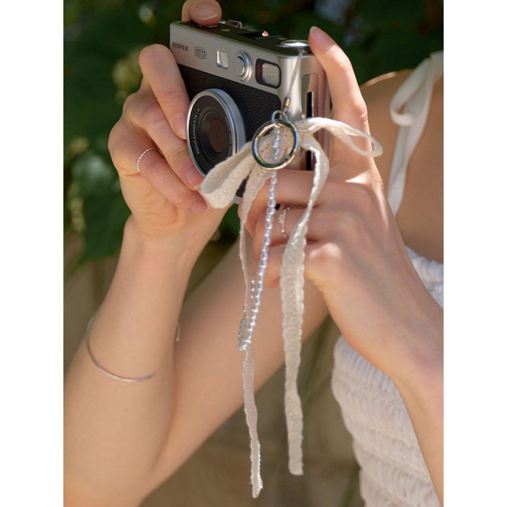 RE_L Bead ribbon key-ring (natural)