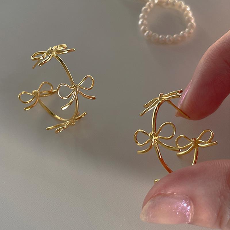 Metal Empty Bow Stud Earrings Female Niche Design Sense Simple And Elegant High-End Fashion Versatile Earrings