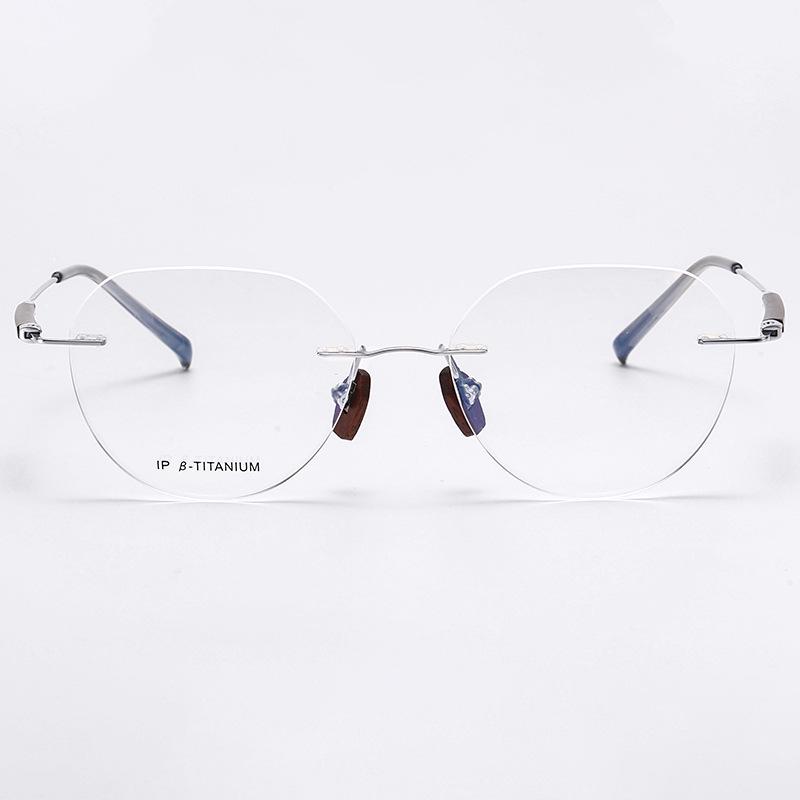 2025 Randlose Retro Sandelholzbrillen: Damen Leichter Luxus ohne Sehstärke, Blaulichtfilter mit Business-Herrenstil.