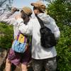 Color Block Backpack with Front Drawstring Pocket and Dual Carrying Options