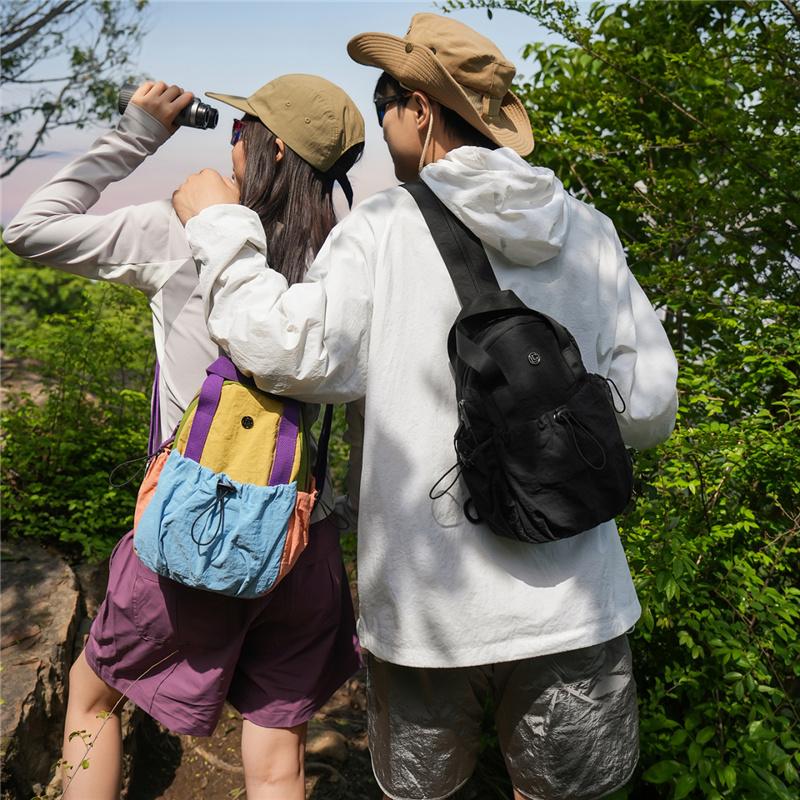 Color Block Backpack with Front Drawstring Pocket and Dual Carrying Options