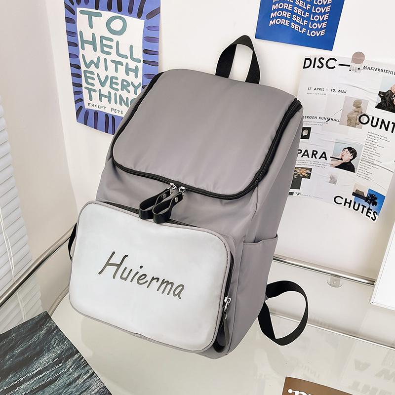 

Новий шкільний рюкзак великої місткості в японському жіночому рюкзаку, модний простий рюкзак для учнів середньої школи, відправляється від імені інших. сірий колір