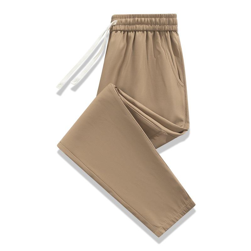 

Men s outdoor tooling charging pants waterproof spring and autumn new casual sports mountain climbing men s breathable trousers 4XL