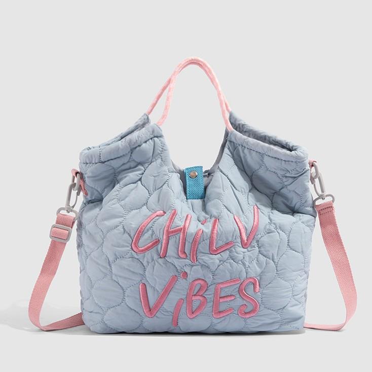 

Large capacity student commuter bag women s 2025 new portable tote bag letter embroidered shoulder bag going oblique span bag