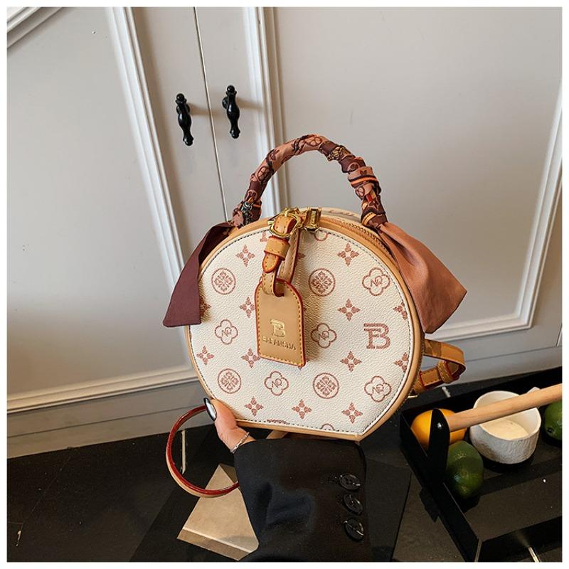 Diagonale Überspannung Nische runde Kuchen Tasche Damen vielseitige Ein-Schulter Messenger Bag High-End kleine runde Tasche Frühling und Sommer Damen Tasche