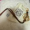 Used Anagram Keyring Gold Brown