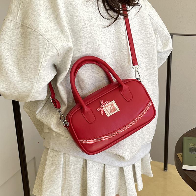 Korean ins hand-held bowling bag women's 2025 spring new fashion shoulder oblique span bag high-end small square bag