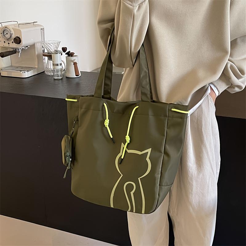 

Large Capacity Nylon Tote Bag for Women Vibrant Orange with Cartoon Cat Design, Drawstring Closure, Includes Matching Pouch, Ideal for Commuting зелёный