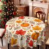 Un mantel, con un estilo temático, que presenta un estampado de calabazas y hojas inspirado en el otoño en la superficie.zyc