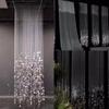 Acrylic Crystal Bead Curtain with Gold and Silver Sequin Pendants for Wedding and Banquet Hall Decor.