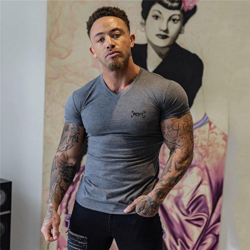 Muscleguys Summer Men’s Casual Fashion All-match T Shirts Cotton V-neck Printed Short-sleeve Bodybuilding Fitness Tops Best Seller