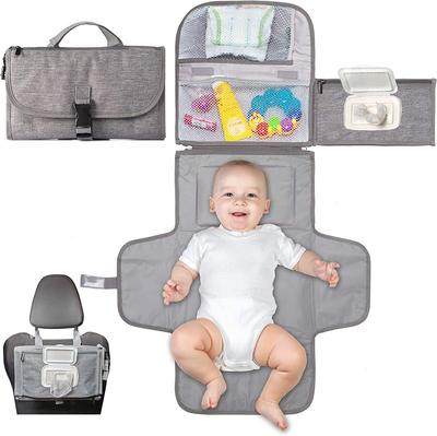Table à langer portable imperméable d'extérieur pour bébé avec barrière anti-urine