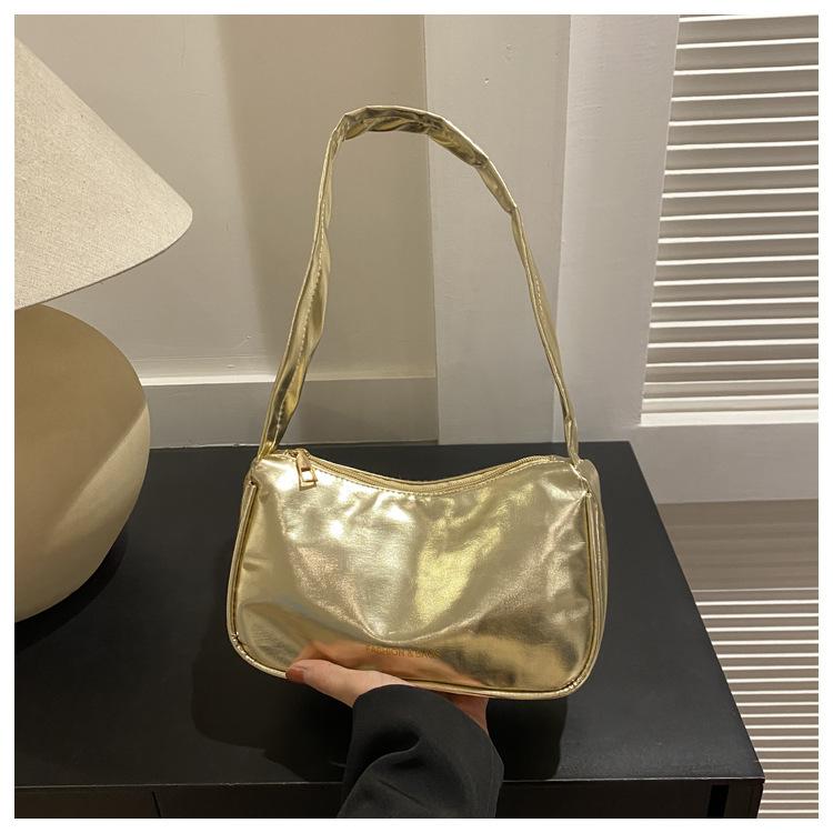 

Лазерная тенденция конфетный цвет личность иностранный простой пригородный тоут мода ручная подмышка маленькая квадратная женская сумка золотой