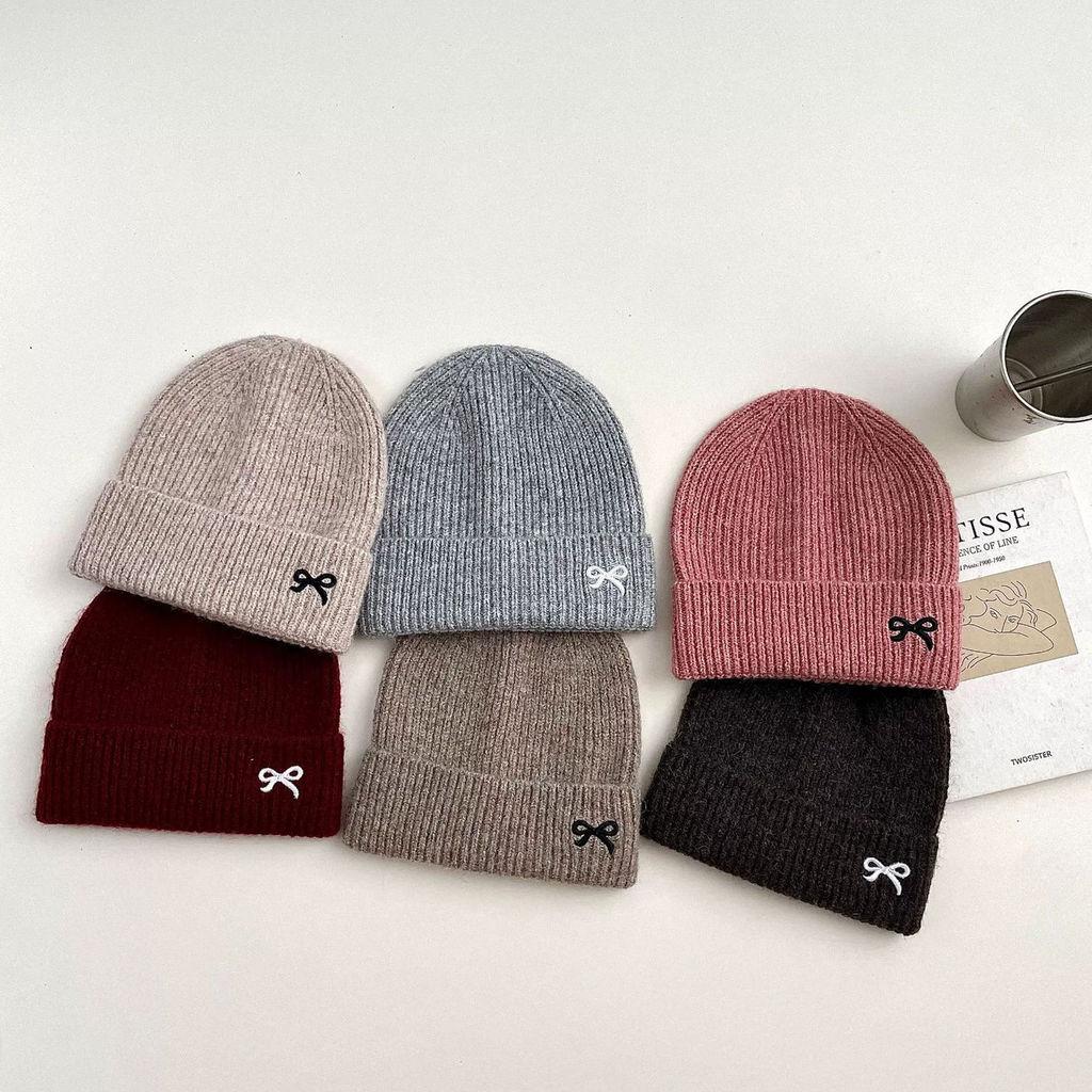 Winter Knit Hat With Bow Embroidery For Fashionable Outdoor Warmth