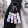 Taschenanhänger Tastatur Fidget Schlüsselanhänger 4 Tasten Knopf Fidget Clicker Spielzeug Tastenkappe Schlüsselanhänger Geschenke