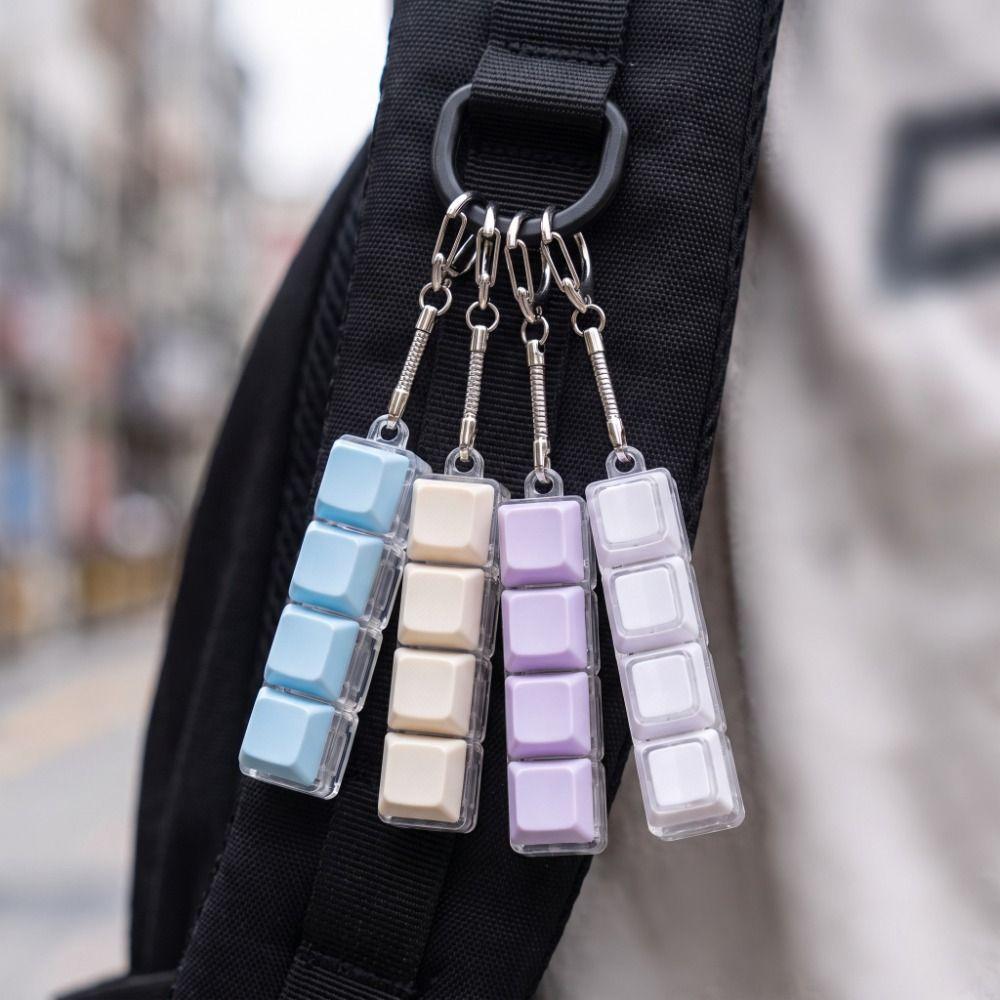 Taschenanhänger Tastatur Fidget Schlüsselanhänger 4 Tasten Knopf Fidget Clicker Spielzeug Tastenkappe Schlüsselanhänger Geschenke