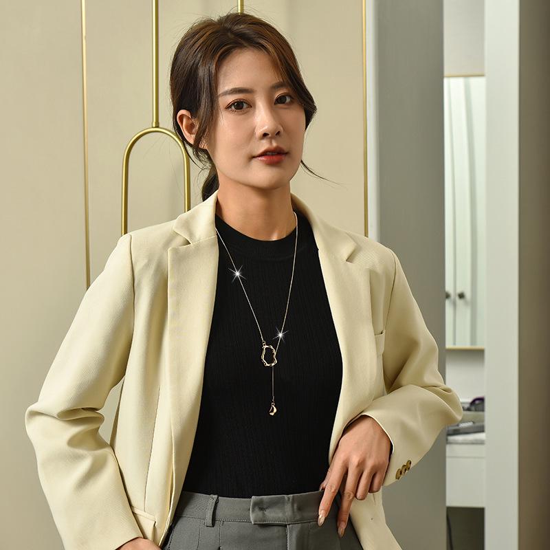 Elegant Geometric Tassel Necklace: Luxurious Long Sweater Chain with Clavicle Choker Pendant for Women